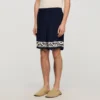 Fliessende Shorts mit Kontrastmuster
