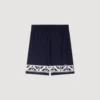 Fliessende Shorts mit Kontrastmuster