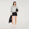 Gestreifte Shorts mit Perlenstickerei