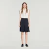 Lange, hoch taillierte Plissee-Shorts