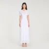 Maxikleid aus gestricktem Stoff mit Perlenverzierung