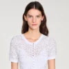 Maxikleid aus gestricktem Stoff mit Perlenverzierung