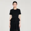Maxikleid aus Strick mit Schößchen
