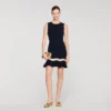 Minikleid aus Strick mit Metallkette