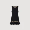 Minikleid aus Strick mit Metallkette