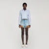 Shorts aus Jeans und Wildleder mit Nieten