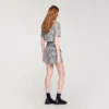 Shorts aus Tweed mit Hahnentrittmuster und Pailletten