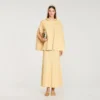 Strassbesetztes Strickcape