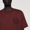 T-Shirt mit gehäkelter Baumwollblume