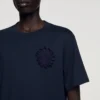 T-Shirt mit gehäkelter Baumwollblume