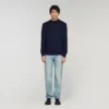 Wollpullover mit hohem Kragen